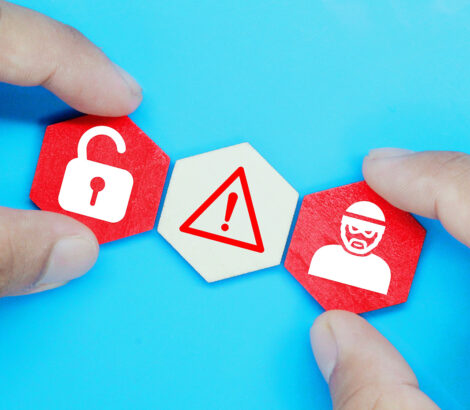 An illustration with three hexagons featuring cyber robber icons, caution, and unlock, representing website safety and security.